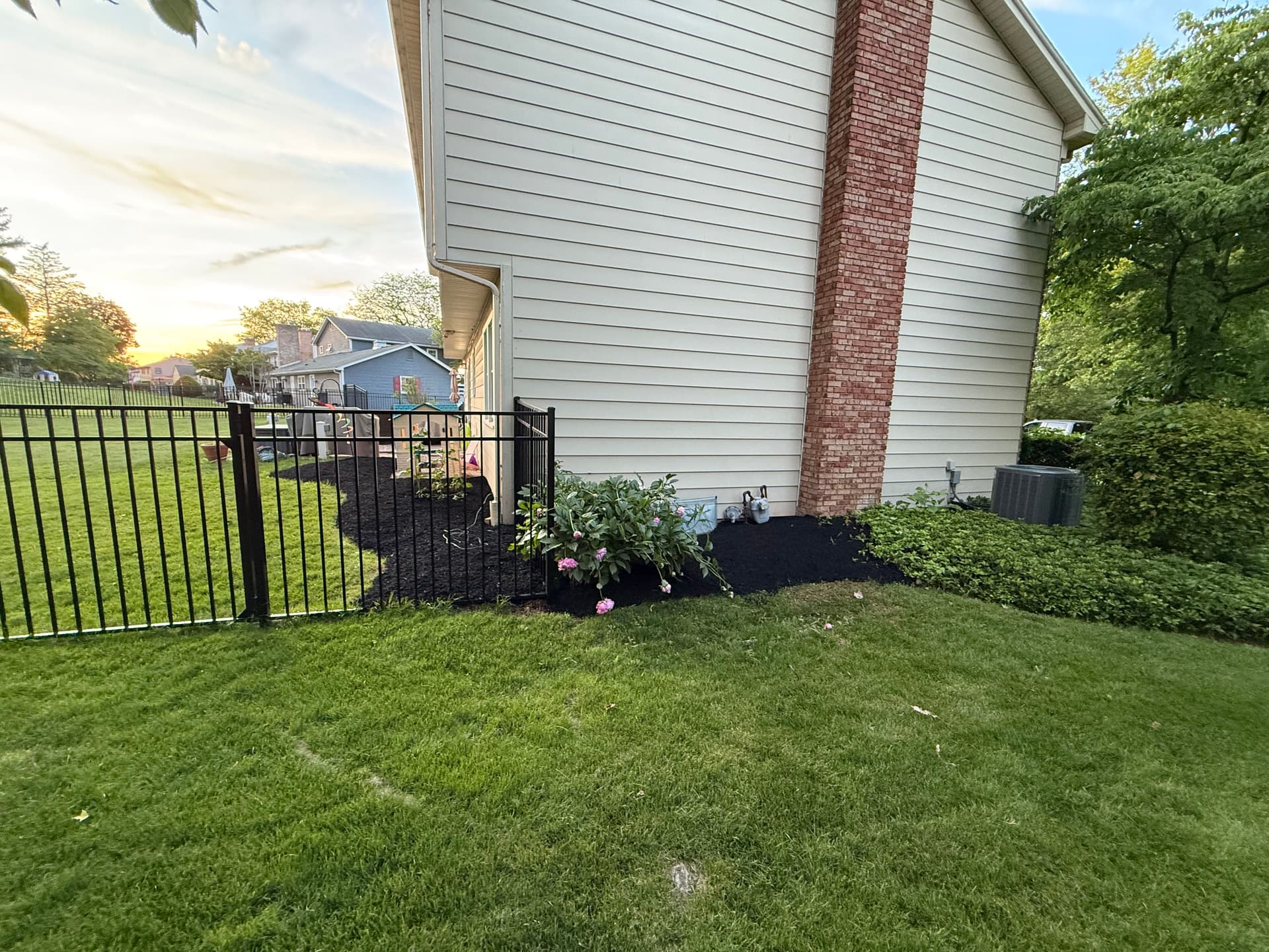 Gallery photos for Black Mulch Refresh That Makes the Whole Yard Look Sharp: Image #1