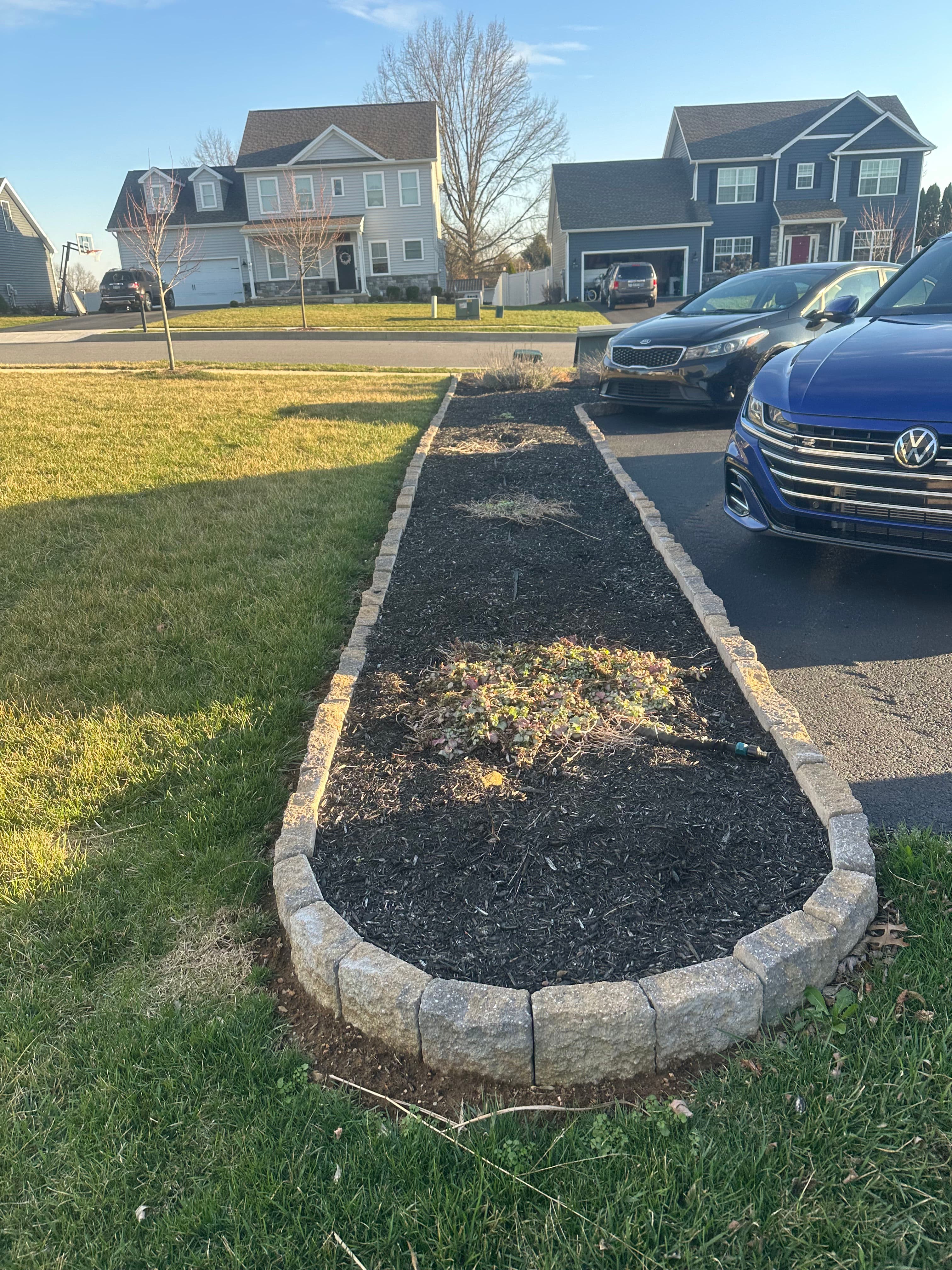 Project Mulching and Hardscaping Excellence in Backyard Spaces image
