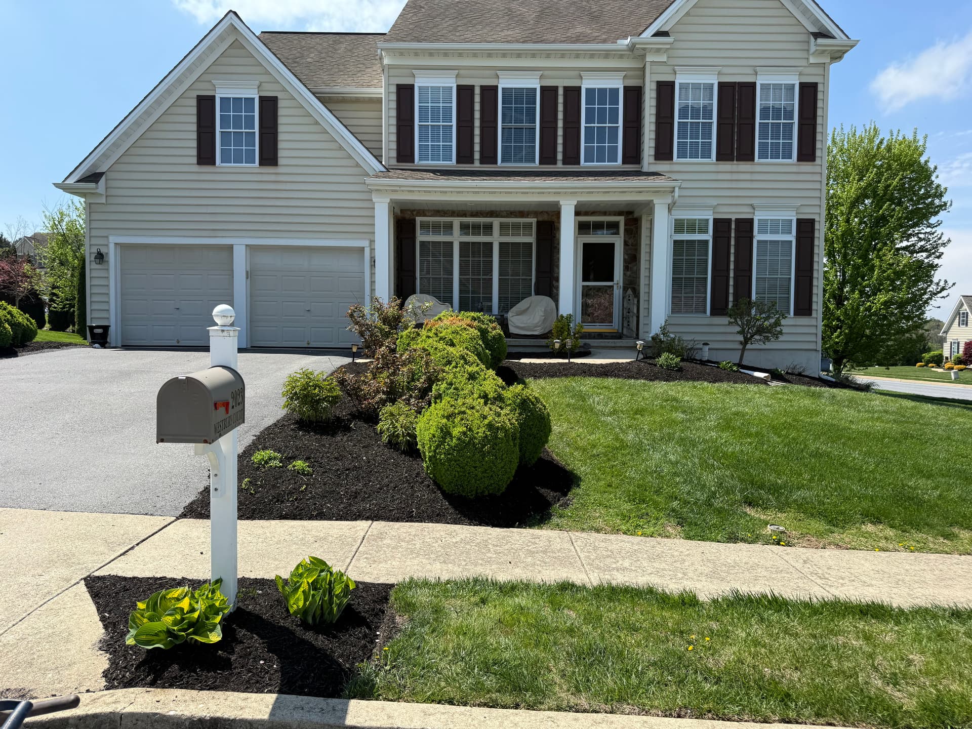 Fresh Mulch and Lawn Mowing That Took This Property to Another Level image