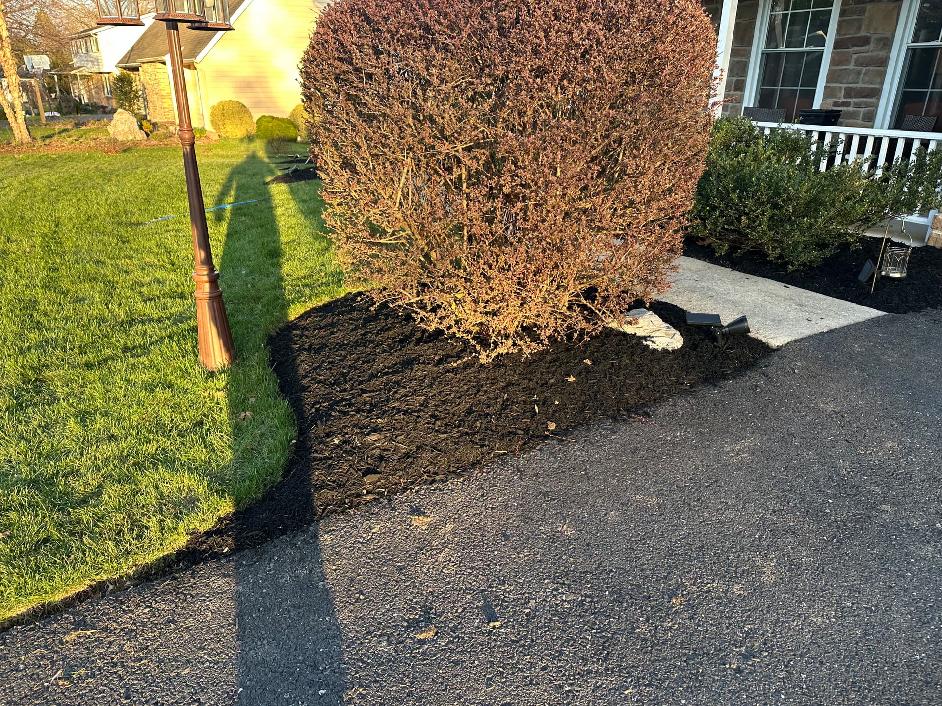 Gallery photos for Boost Your Backyard Appeal with Black Mulch and River Rock: Image #4