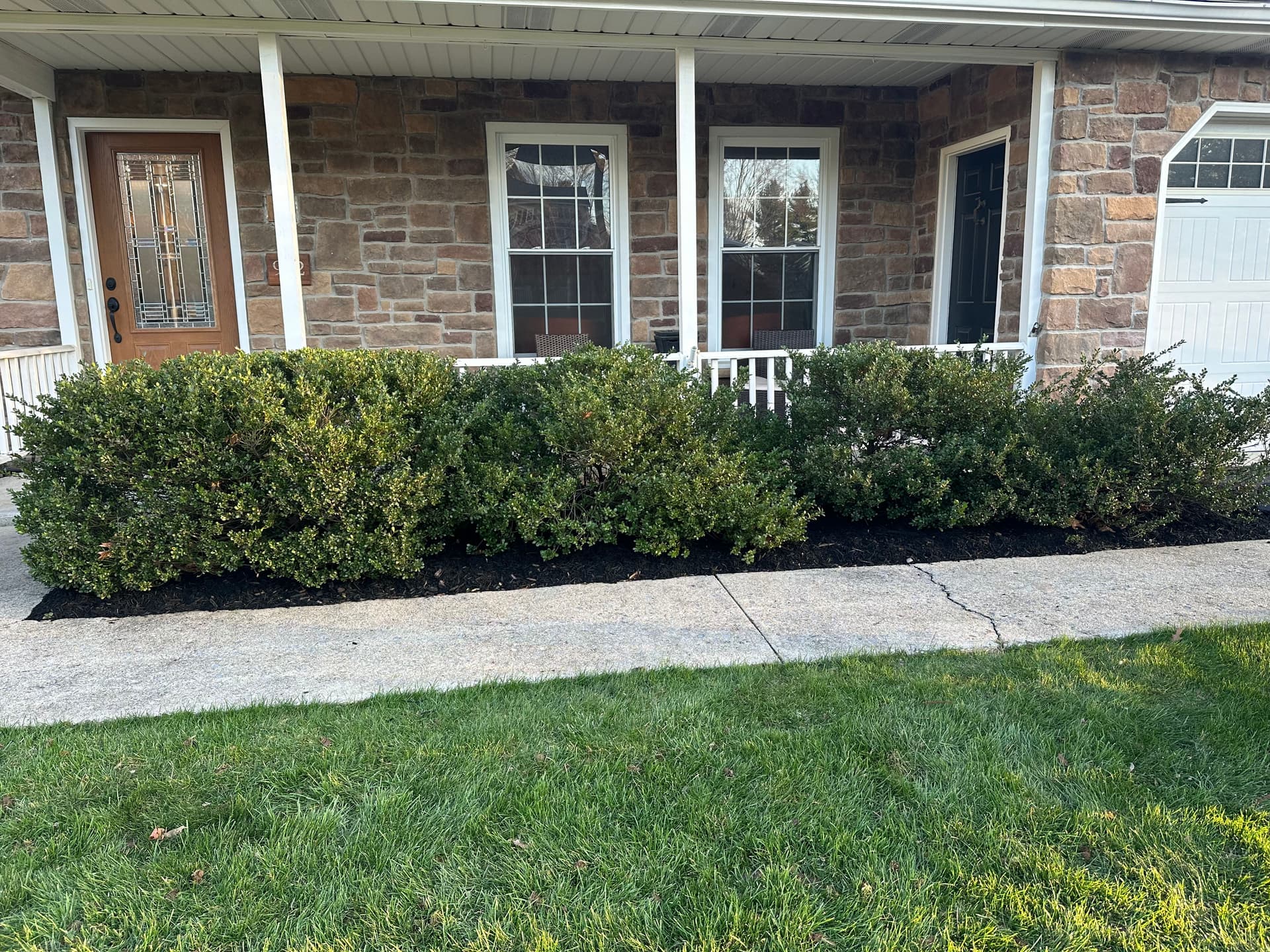 Gallery photos for Boost Your Backyard Appeal with Black Mulch and River Rock: Image #6